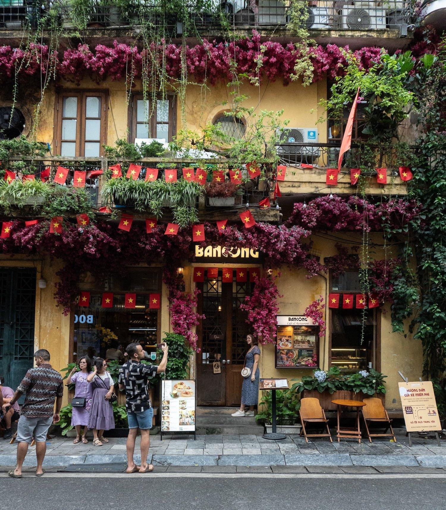 Outdoor seating at French bistro in Hanoi Old Quarter