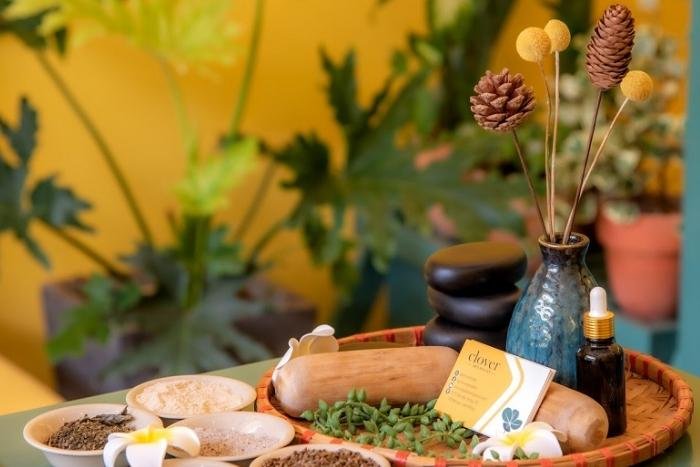 Vietnamese herbal spa treatment preparation with fresh local ingredients