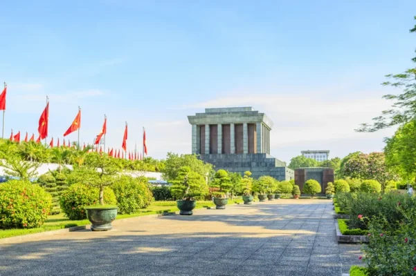 In front of the Mausoleum stands Ba Dinh Square featuring a parade route and 79 marigold trees