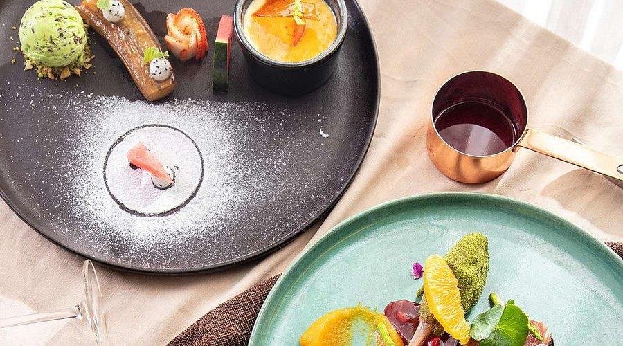 Elegantly plated Asian fusion dish in Old Quarter restaurant