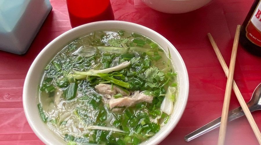 Authentic bowl of pho served in Hanoi Old Quarter street stall