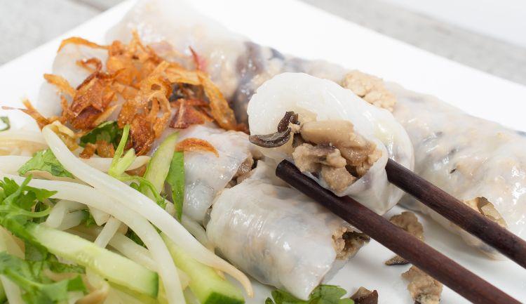 Freshly made Bánh Cuốn steamed rice rolls with dipping sauce