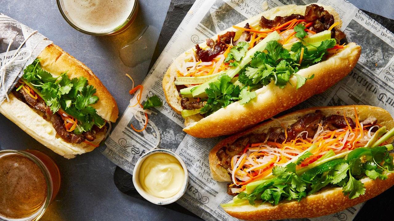 Assorted banh mi sandwiches with various fillings in Hanoi Old Quarter
