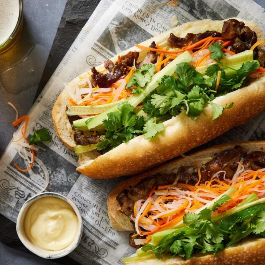 Fresh ingredients for making banh mi being prepared in Hanoi