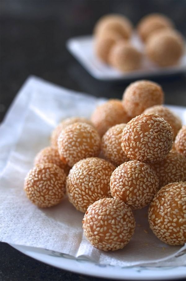 Golden crispy banh ran fried glutinous rice balls with sesame seeds