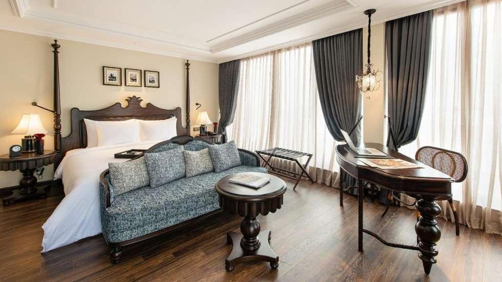 Stylish interior of a boutique hotel in Hanoi Old Quarter featuring traditional Vietnamese design elements