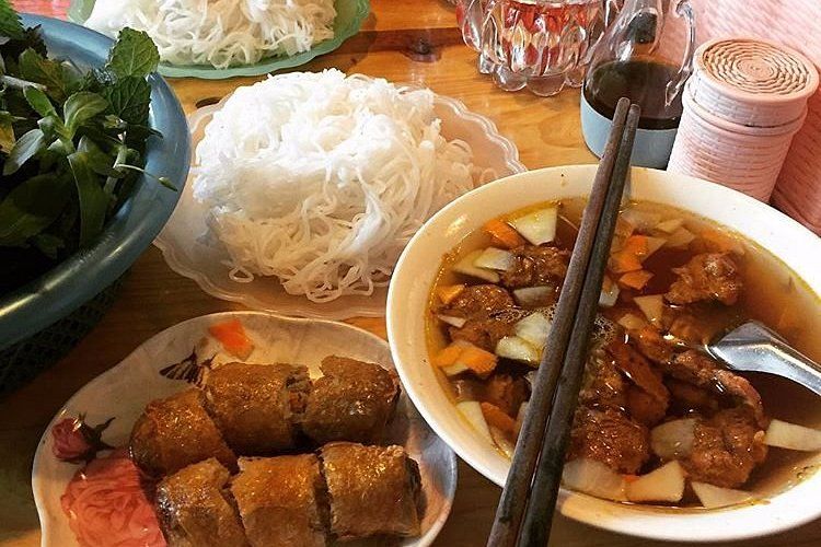 Traditional bun cha preparation in Hanoi