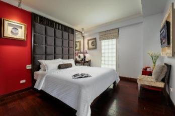 Church Boutique Hotel Hanoi cozy room with Vietnamese design elements