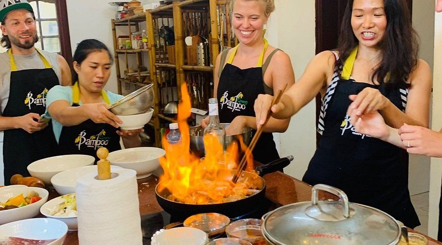 Clean Vietnamese street food vendor preparing fresh ingredients safely