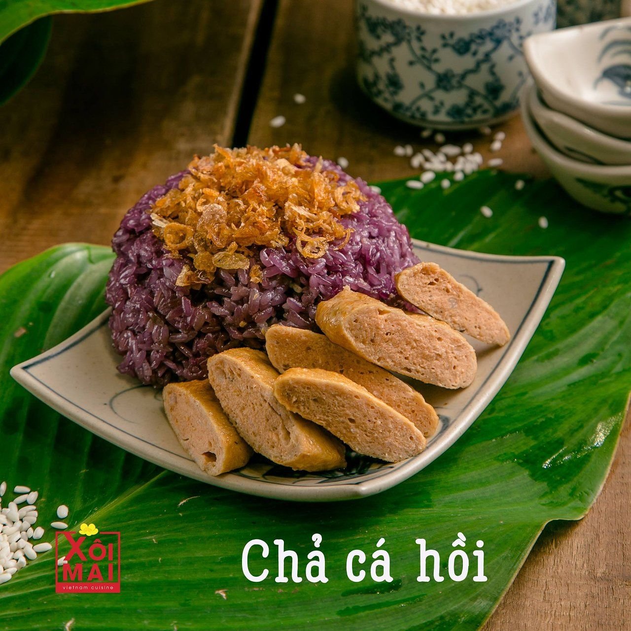 Display of colorful sticky rice varieties at a Hanoi street vendor