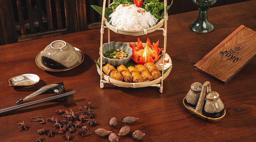 Romantic couple sharing traditional Vietnamese meal