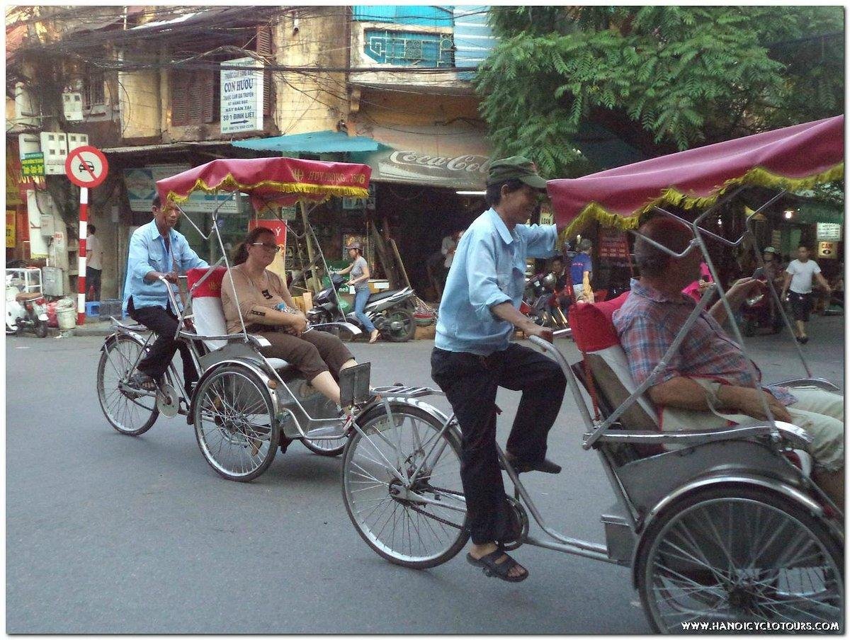 Traditional Vietnamese cyclo on a street in Hanoi Old Quarter