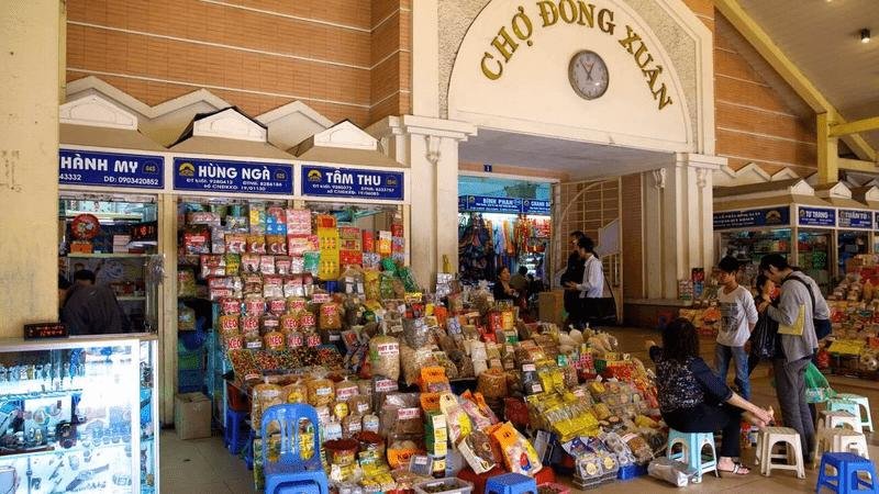 Interior of Dong Xuan Market with various goods for sale