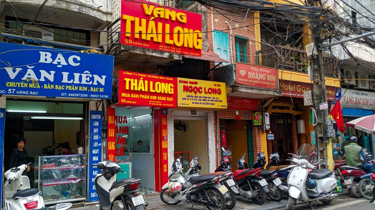 Silversmith crafting traditional jewelry on Hang Bac Street in Hanoi Old Quarter