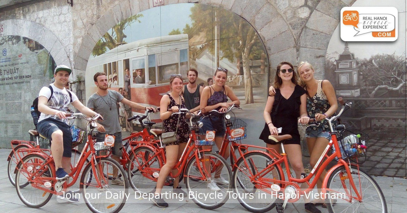 Tour guide giving safety instructions to bike tour participants