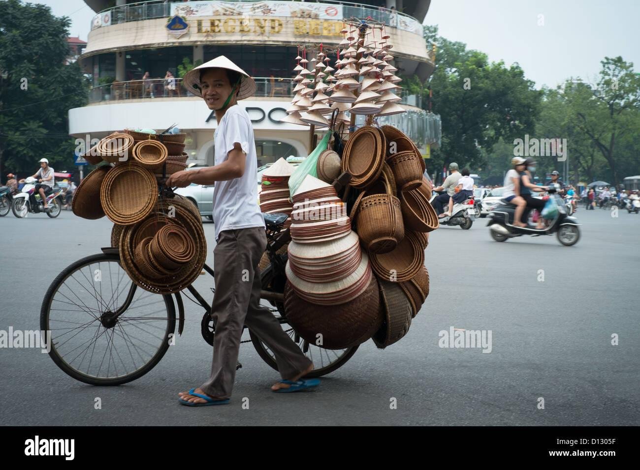 Traditional street vendor with bicycle in Hanoi