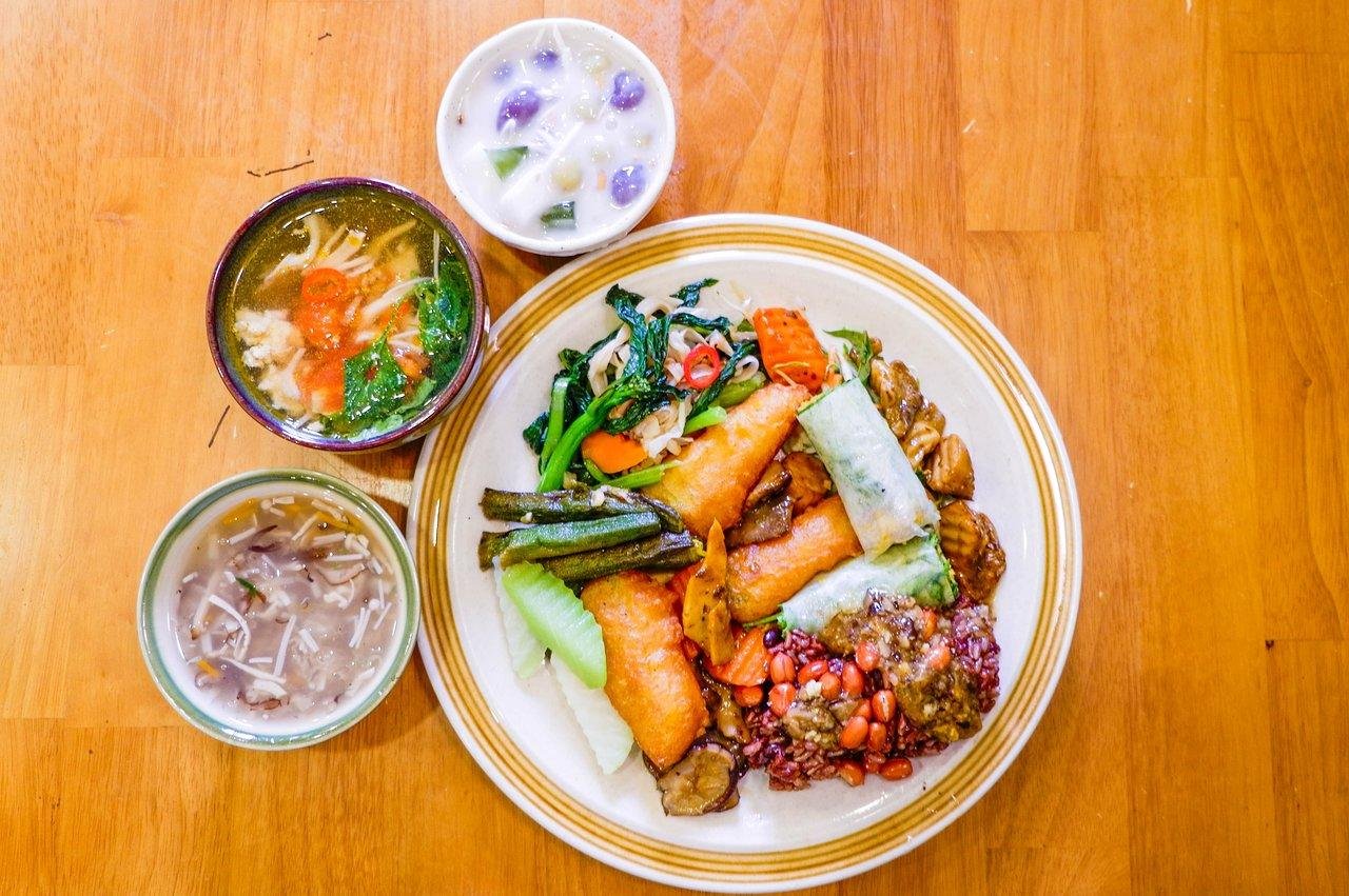 Buddhist monks sharing a communal vegan meal in Hanoi temple