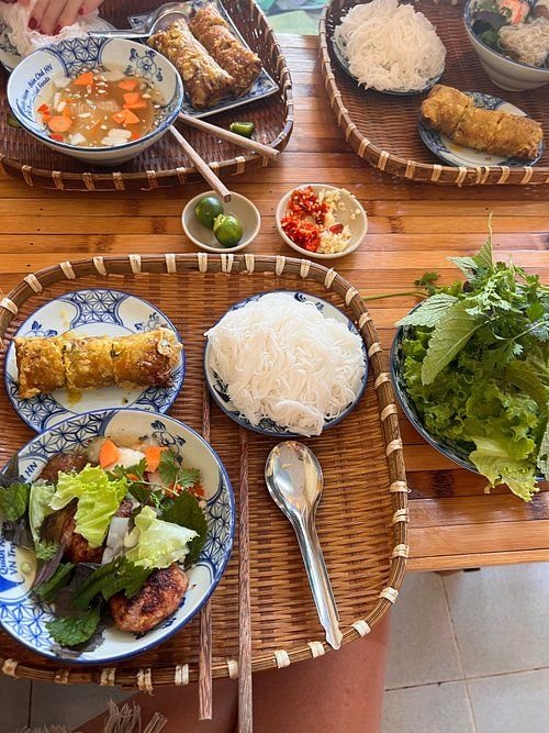 Local eating bun cha at a traditional Hanoi restaurant