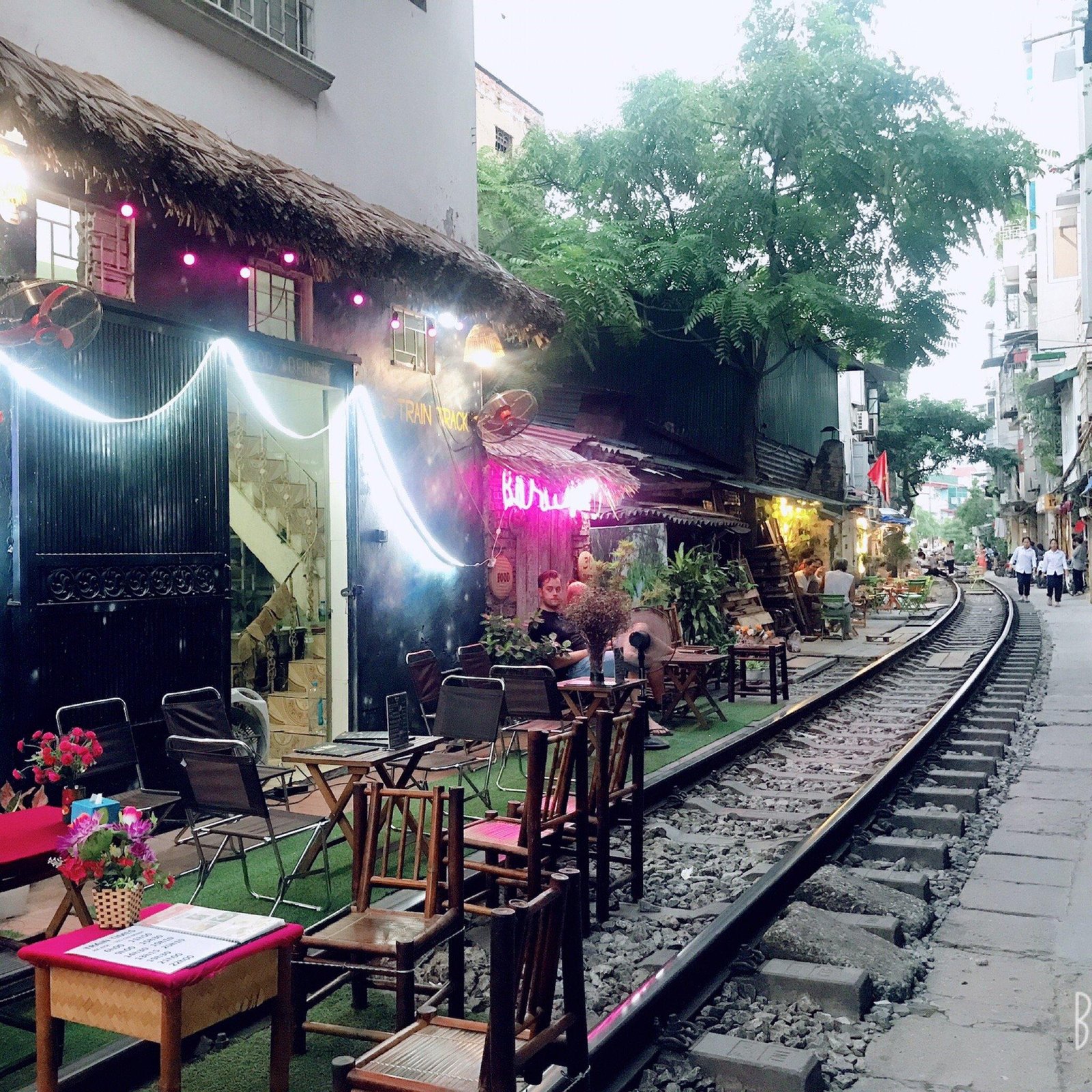 Covered coffee stalls during Hanoi rainy season