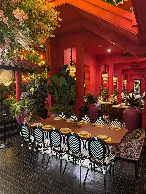 Elegantly plated Vietnamese cuisine in a romantic restaurant setting with soft lighting