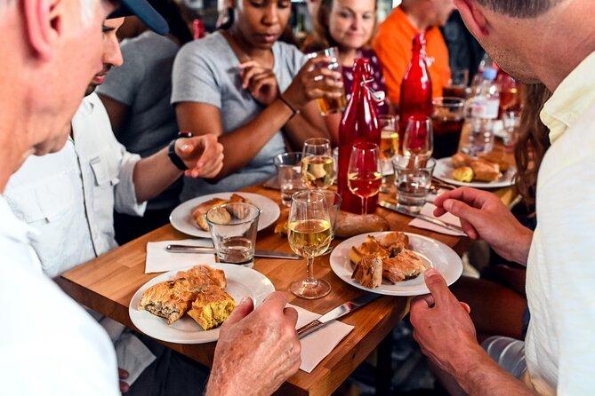 Tourists enjoying memorable moments during food tour