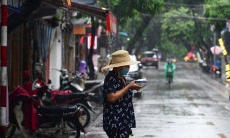 Hanoi street scenes across different seasons showing weather variations