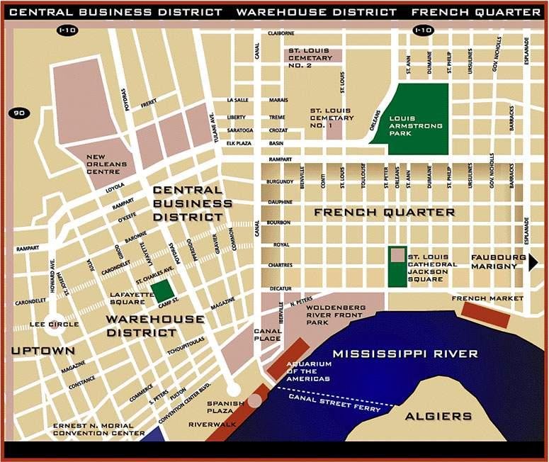 Traveler researching hotel bookings with French Quarter map and guidebook