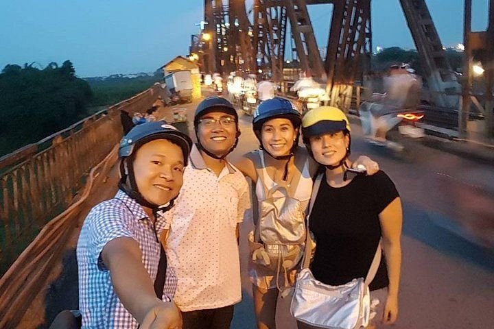 Private motorbike food tour stopping at local pho stall in Hanoi