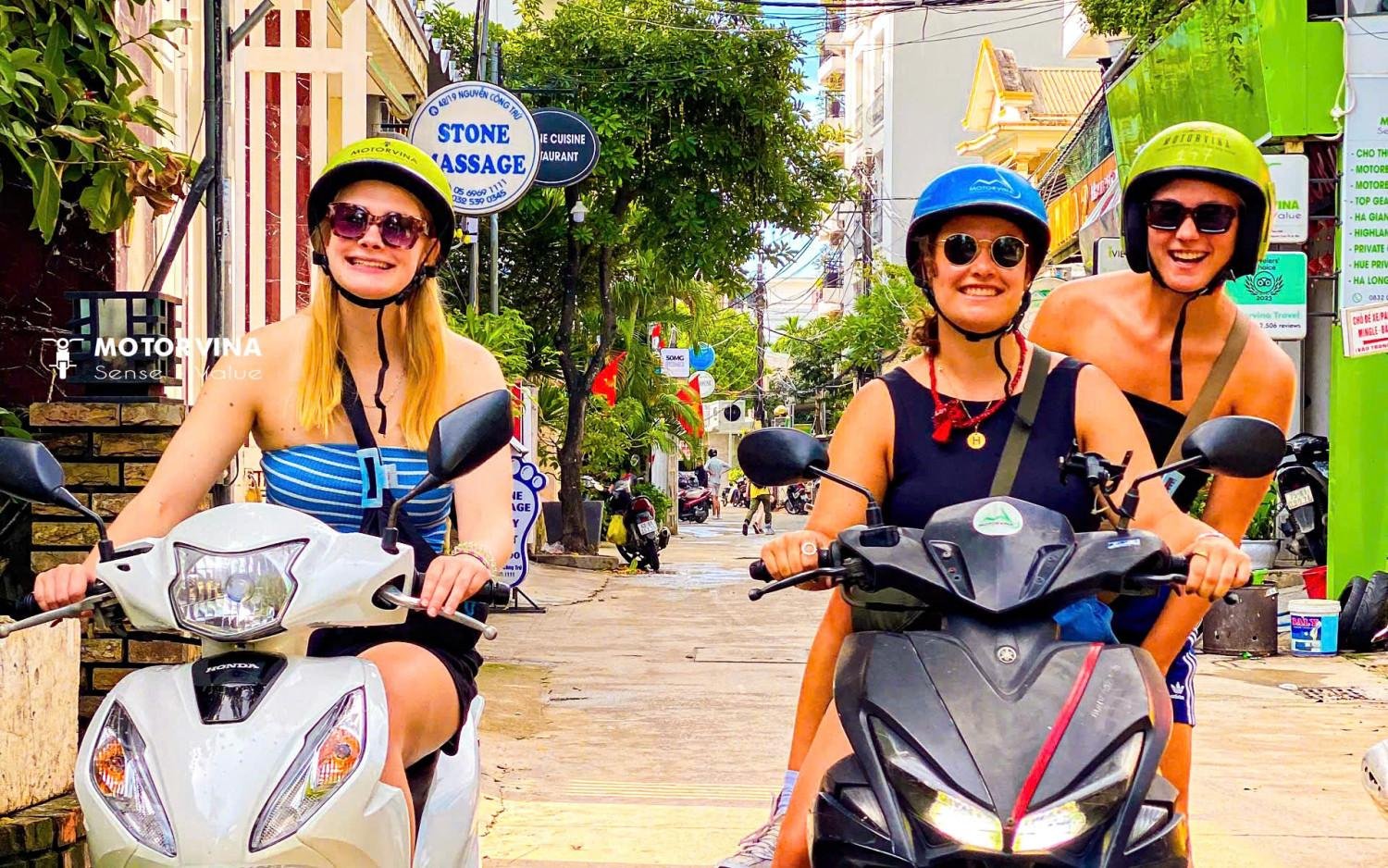 Tourist completing paperwork for motorbike rental in Hanoi