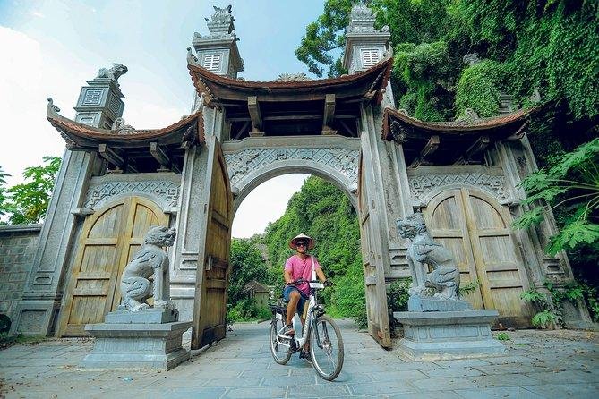 E-bike parked in Hanoi Old Quarter with traditional architecture