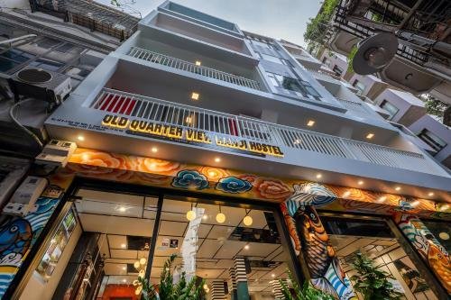 Bustling street view of Hanoi Old Quarter with hostels