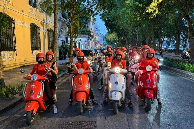 Vespa food tour photography in Hanoi during rain season