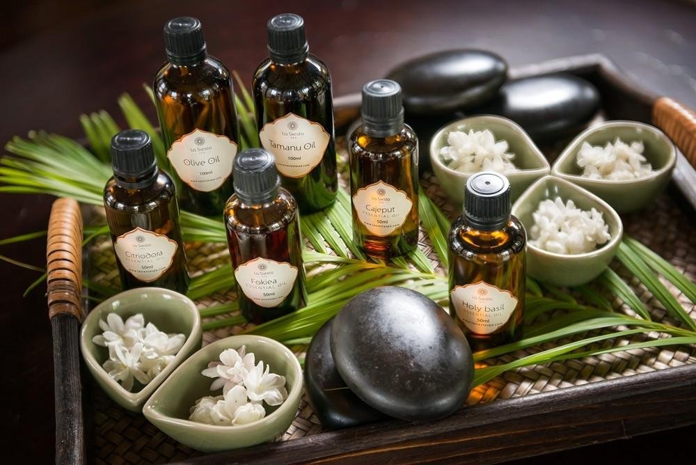 Selection of aromatherapy oils used in Hanoi spas with natural ingredients