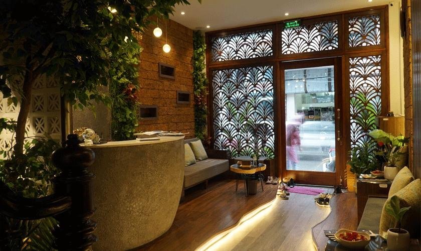 Elegant spa treatment room with traditional Vietnamese decor elements in Hanoi Old Quarter