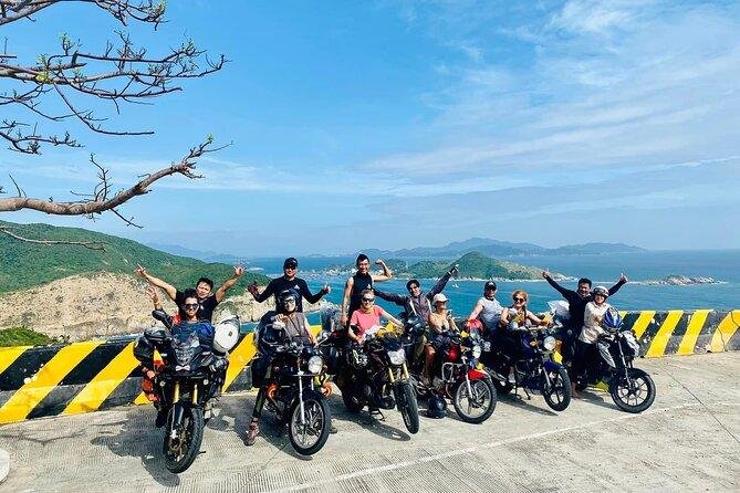 Traveler interacting with local Vietnamese during motorbike journey