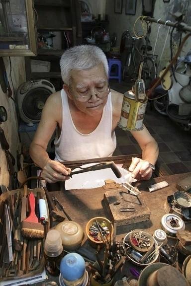 Traditional handicrafts displayed in an Old Quarter shop
