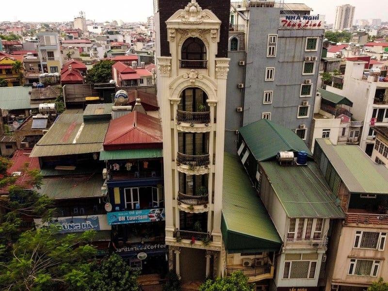 Traditional tube houses in Hanoi Old Quarter showing narrow facades and extended depth