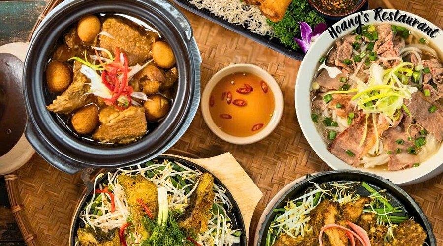 Local street vendor preparing vegan Vietnamese dishes
