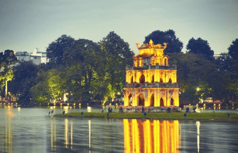 Hoan Kiem Lake with French Quarter buildings in background
