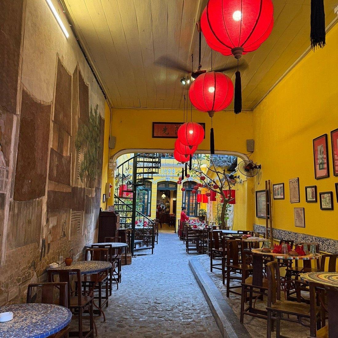 Elegant interior of Madame Hien restaurant with colonial decor