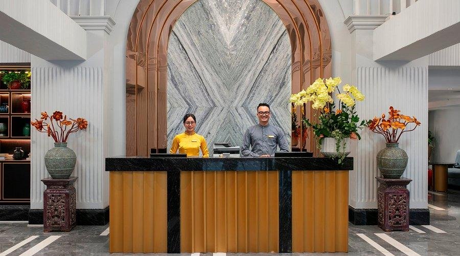 May De Ville Hotel elegant lobby with traditional Vietnamese touches