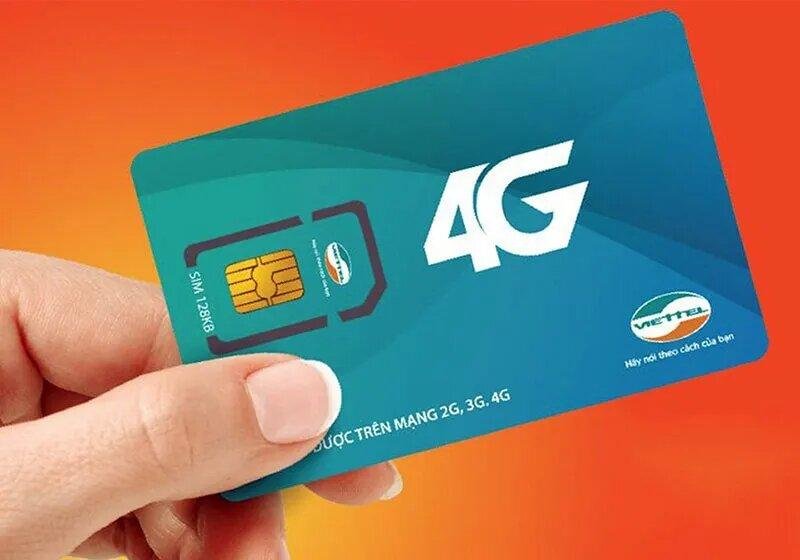 Tourist registering a new Viettel SIM card at store counter