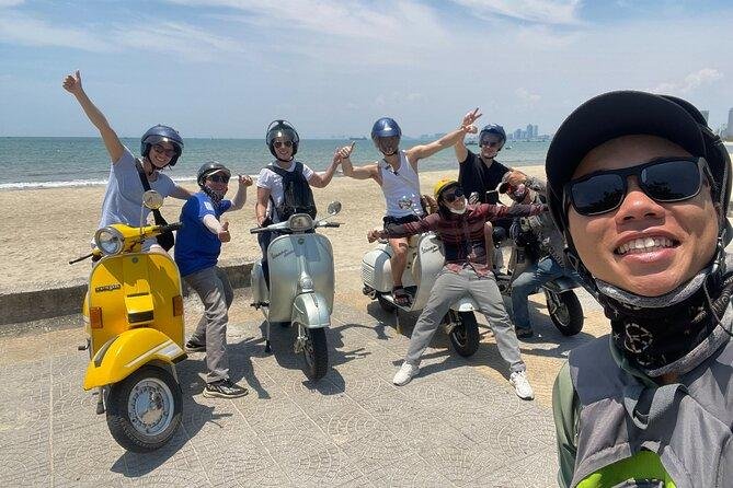 Happy tourists with their local guide after completing vespa food tour