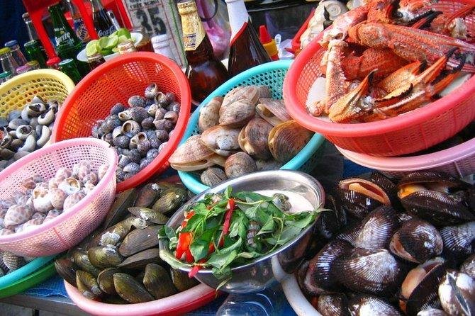 Street food seafood vendor in Hanoi Old Quarter