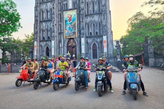 Comparison of Vespa and walking food tours in Hanoi streets
