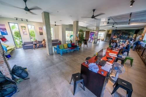 Common area at Vietnam Backpacker Hostel with travelers socializing