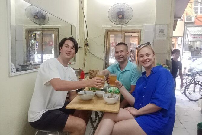Vietnam Travelers luxury food tour group dining at Michelin starred restaurant