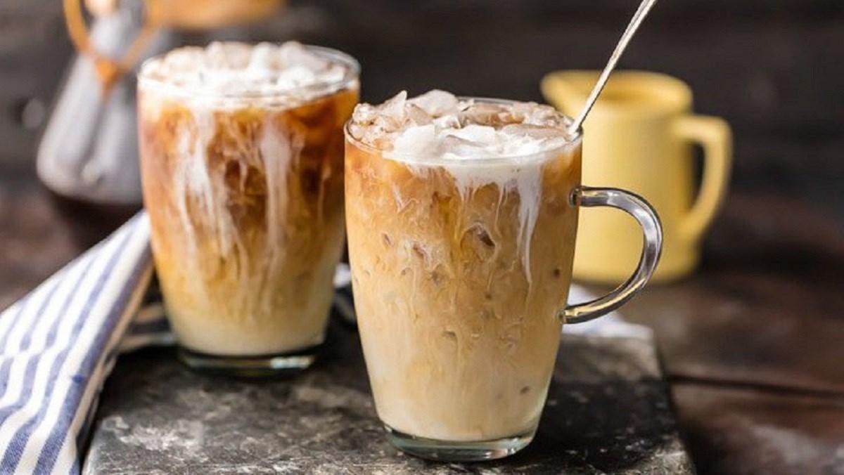 Traditional Vietnamese iced coffee with condensed milk being prepared