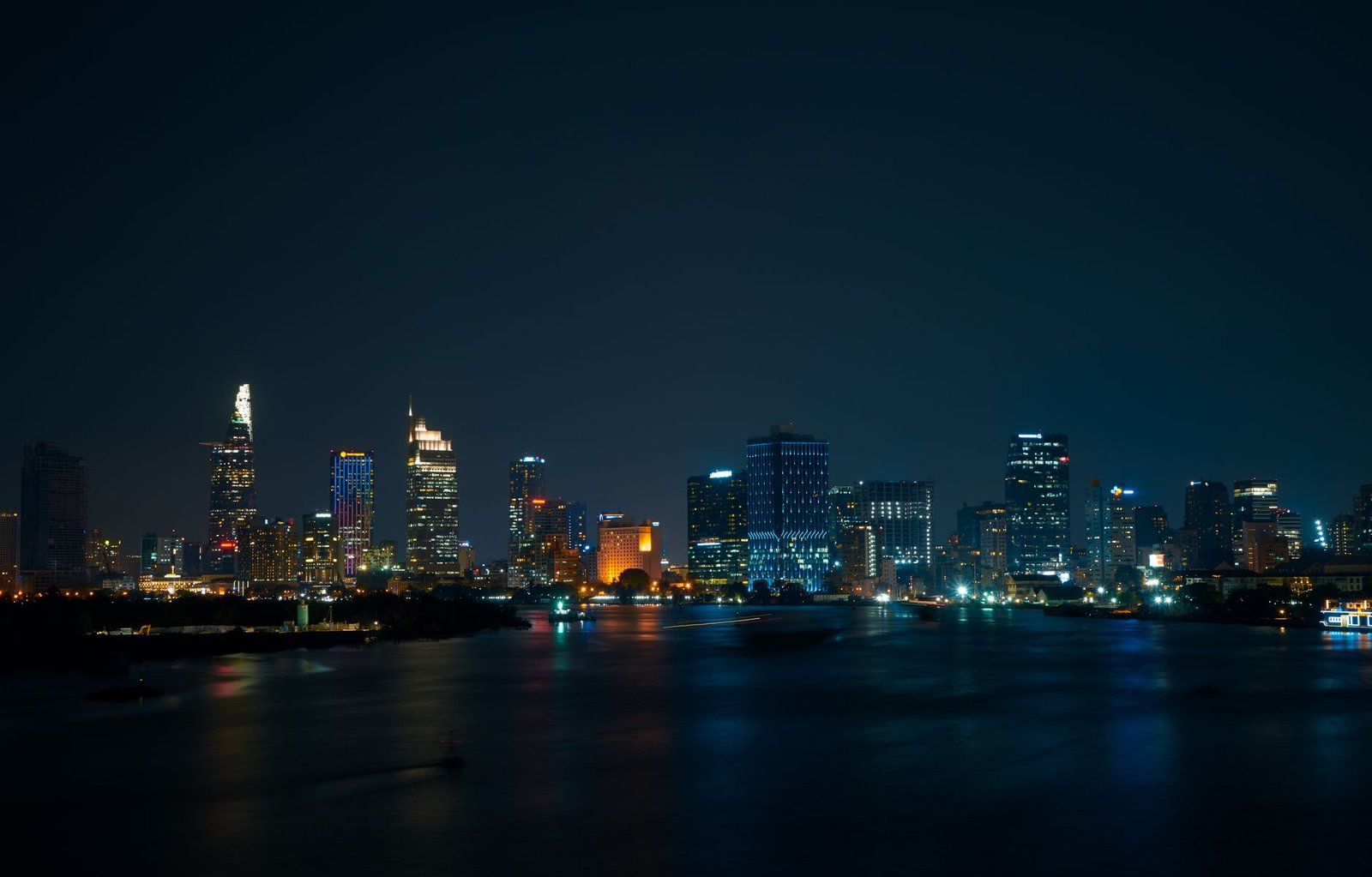The historic City Hall of Ho Chi Minh City illuminated at dusk