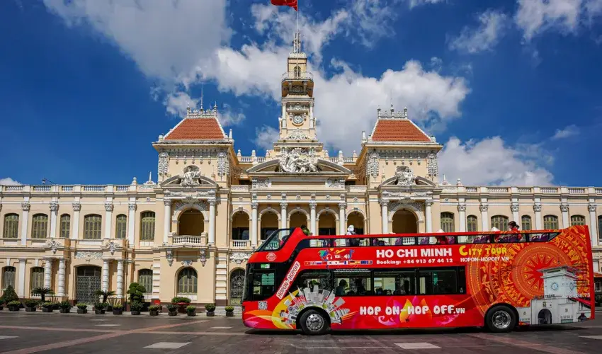 Double-decker buses take tourists to explore the famous landmarks of Ho Chi Minh City